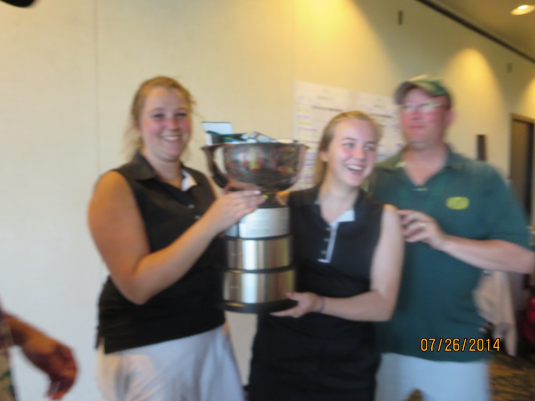 2014 champions Taylor Stroup and Andrea Stone clown around with the BCO Cup.